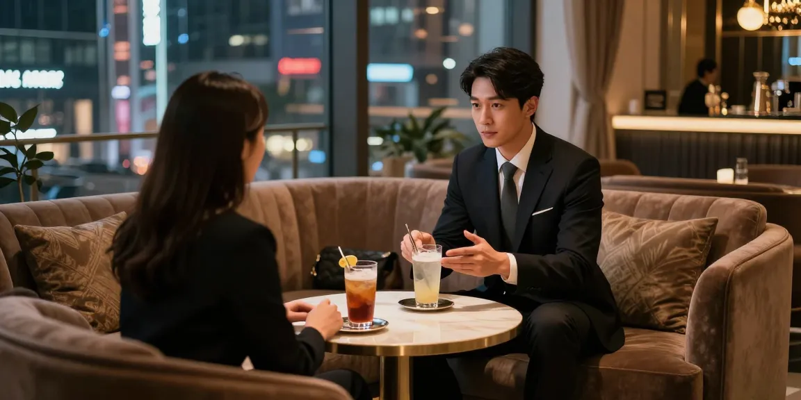강남블랜딩 고급 블렌딩 라운지에서 고객과 매니저의 소통이 있는 우아한 장면